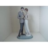 Lladro - a large retired figurine entitled 'Declaration of Love' depicting a couple on their