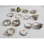 A collection of 14 silver rings