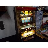 A vintage Fruit Machine 'King of Mouse', ex Japanese Casino model, with internal illumination,