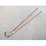 A silver hallmarked walking cane,