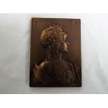 S E Vernier (French) - an early 20th century rectangular bronze plaque obverse female bust R F