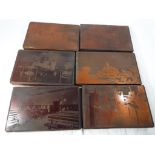 Six wooden printing blocks with copper plates depicting various scenes to include church,