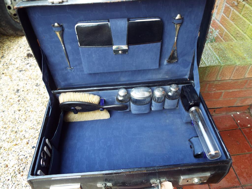 A black case with fitted interior containing a 15-piece vanity set with hallmarked silver mounts, - Image 11 of 11