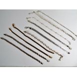 A collection of 10 silver bracelets including some gilt examples