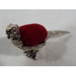 A pheasant pin cushion stamped 925.