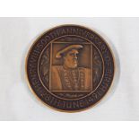 A toned bronze medal designed by Jane McAdam commemorating the 500th Anniversay of the Birth of