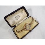 A lady's 9 carat gold cased wristwatch,