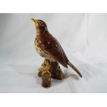 Beswick Pottery - a songthrush finished in gloss, 14.6 cm (h).