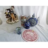 A mixed lot to include a Chinese vase, a Chinese teapot with blue and white design,