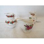 Royal Worcester - three small jugs decorated in a floral pattern comprising a Lamprey Cream Jug,