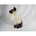 Beswick Pottery - a Siamese cat, seated with head up, finished in gloss # 2139, 35.5 cm (h).