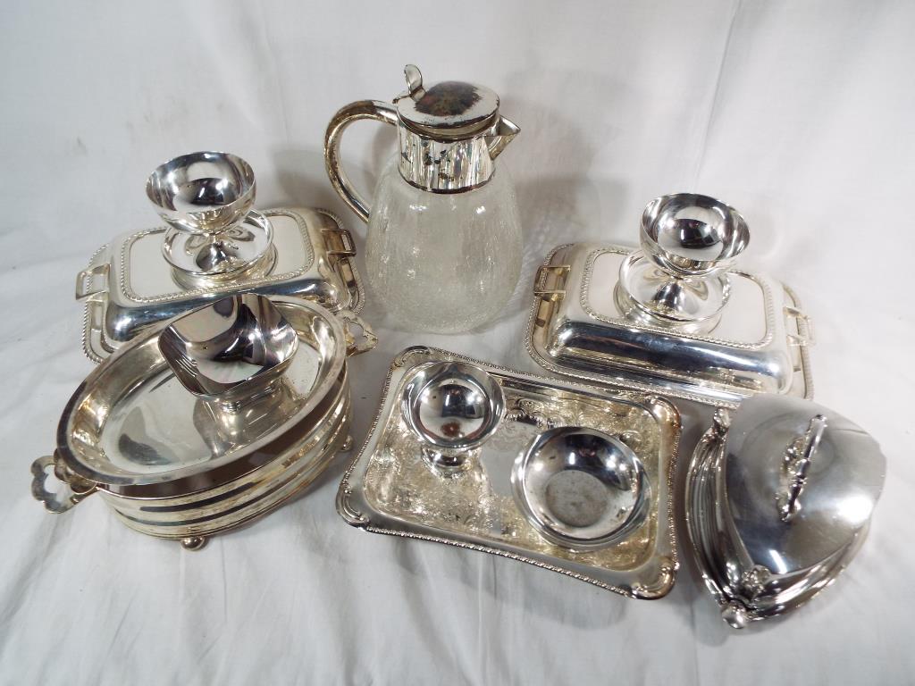 A collection of good quality plated ware to include tureens, desert bowls,