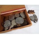 A wooden cheroot box containing a small collection of UK pre-decimal coins to include 20 silver