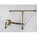 A brass Victorian fire screen