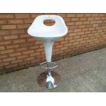 A good quality high gloss adjustable height bar stool