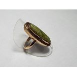 A lady's 9 carat rose gold Cabochon jade dress ring, size O, approx. 5.