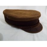 A good quality suede leather peaked Prinz Heinrich cap with two buttons displaying anchors