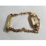 A lady's 9 carat gold cased wristwatch, the rectangular dial marked Everite, Swiss made,