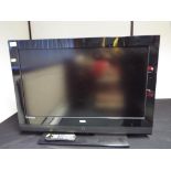 A Logic 32inch flat screen TV with remote control