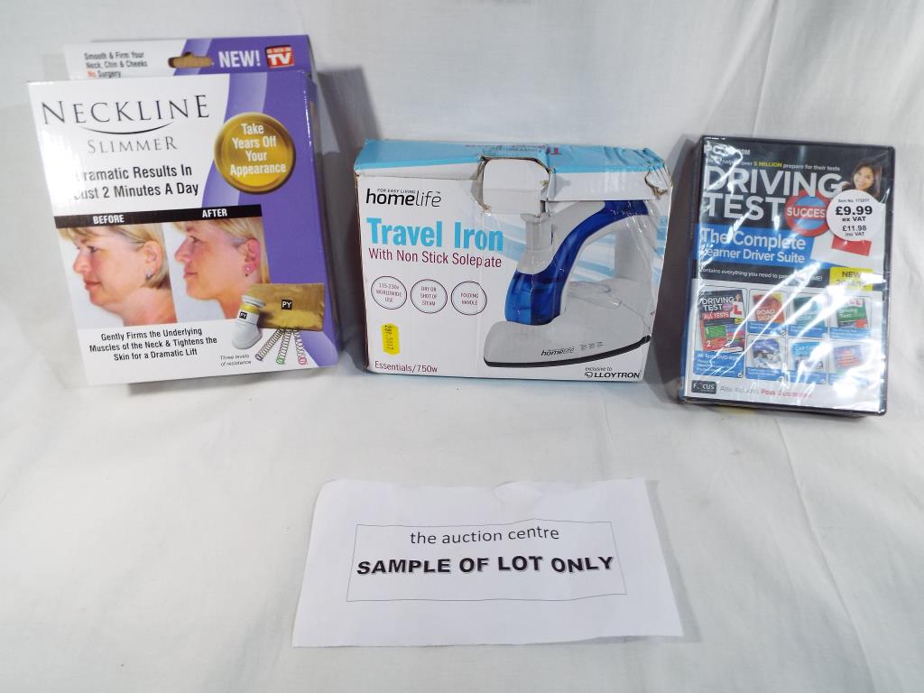 A good mixed lot to include Driving Test Success DVDs, a Home Life travel iron,