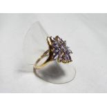 A 9 carat gold lady's ring set with sapphires from QVC, size S and a half, approximate weight 3.