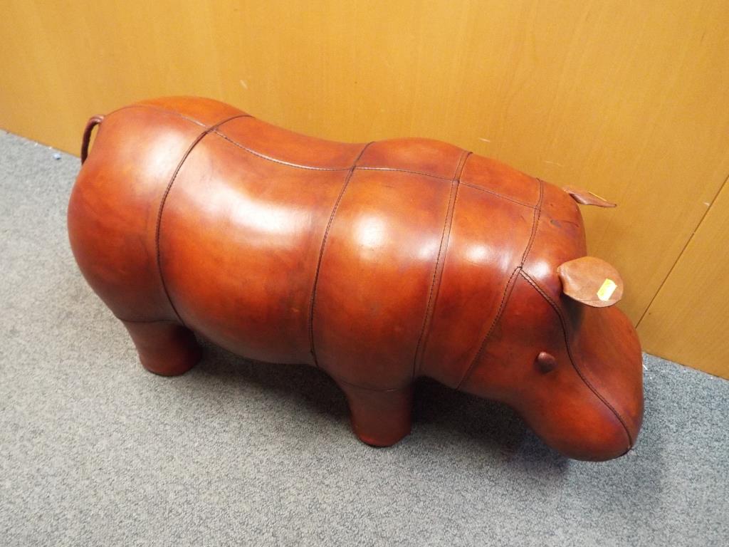 A good quality leather footstool in the form of a hippopotamus,