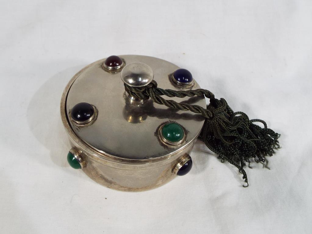 A white metal lidded stone-set trinket box, maker's mark Parks of London, approx 5.5 cm (h) x 7.