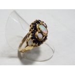 A lady's 9 carat yellow gold sapphire and opal cluster ring, size Q, approx. 5.
