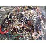 A sealed bag of costume jewellery