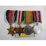 Four World War Two (WW2) campaign medals, 1938-1945 Star, France and Germany Star, Defence medal,