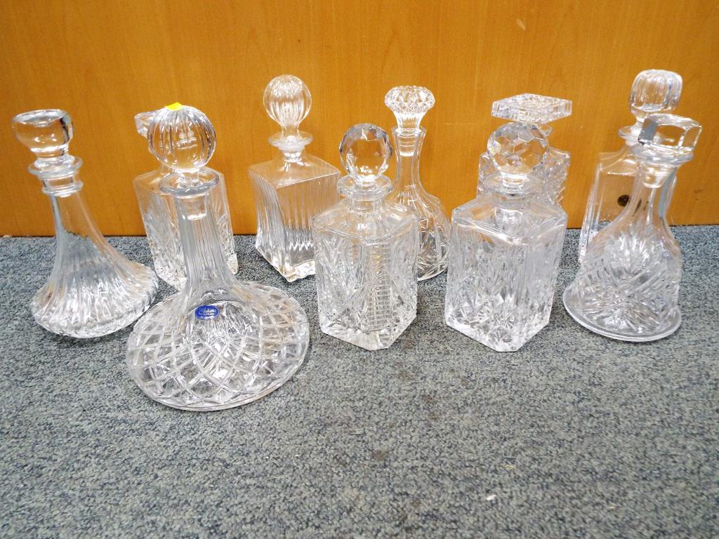 A collection of ten decanters