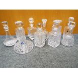 A collection of ten decanters
