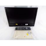 An LCD Alba 15 inch flat screen colour television with manual and remote control, model No.