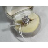 A lady's 9 carat yellow gold cz cluster ring, size N, approx. 3.