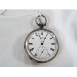 A lady's white metal key wind pocket watch, the case within stamped Fine Silver CB,