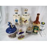 A 750 ml decanter of Lamb's Navy Rum, 200 ml flask of Pusser's Navy Rum, 26.