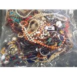 A sealed bag of unsorted costume jewellery