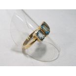 A lady's 9 carat yellow gold three stone zircon dress ring, size O, approx. 3.