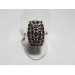 A lady's silver and marcasite dress ring,