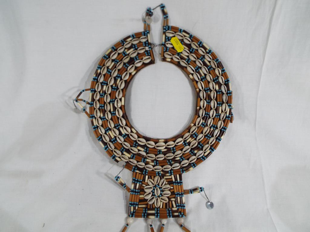 An African Maasai necklace and a set of South African chess pieces - Image 2 of 3