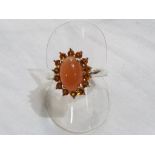 A lady's silver dress ring set with citrine, size T.