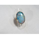 A lady's antique gold opal doublet ring, size L, approx. 5.