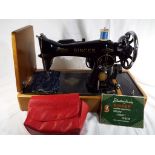 A sewing machine with carry case