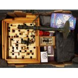 A good mixed lot to include a camera and binoculars, a metal candlestick, a cased backgammon set,