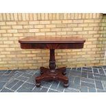 A Victorian mahogany fold over tea table,