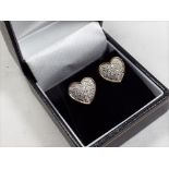 A pair of 9 carat gold 1/2 carat diamond cluster stud earrings, approx. weight 2.