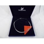 Swarovski Crystal - a lady's crystal necklace in original presentation case with certificate,
