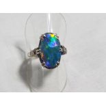 A lady's 18 carat white gold and platinum opal doublet and diamond dress ring, size N, approx. 4.
