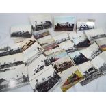 A collection of approximately 100 predominantly black and white railway related postcards.
