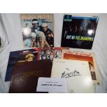 A good lot to include three record cases, a collection of approximately 70 x 33.
